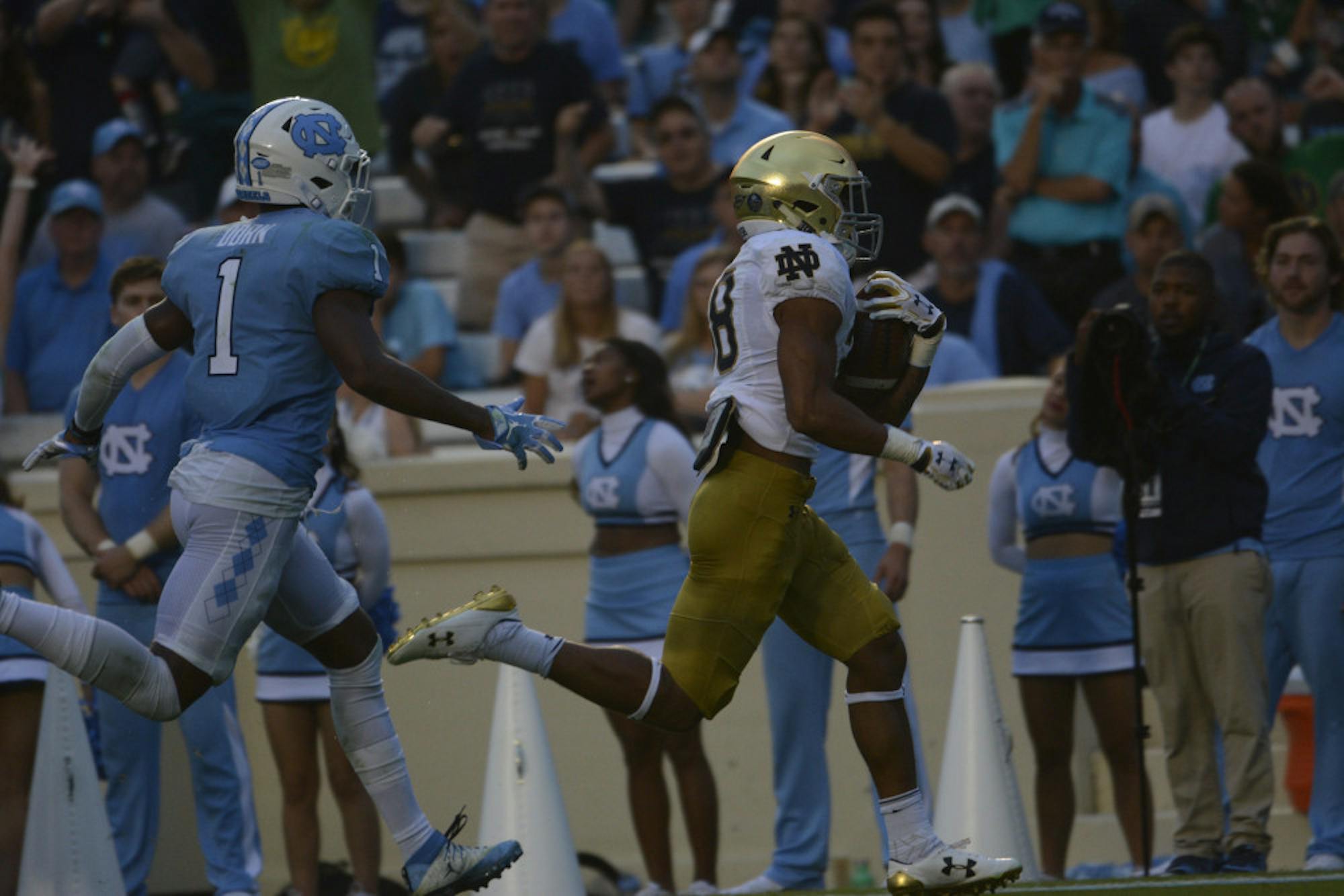 Irish sophomore running back Deon McIntosh outpaces a defender during Notre Dame's 33-10 win over North Carolina on Saturday at Kenan Memorial Stadium in Chapel Hill, North Carolina.