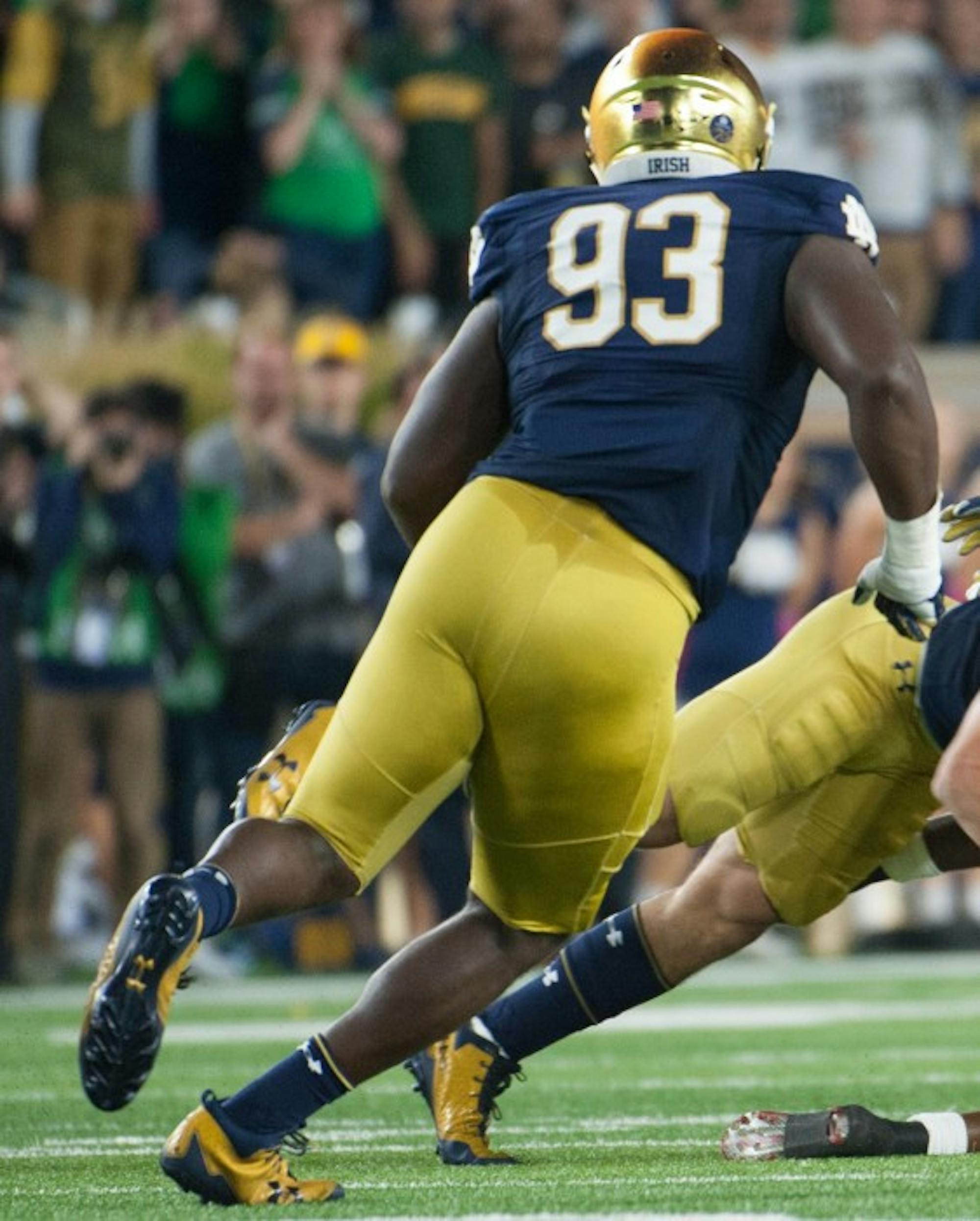Jay Hayes rushes in to make a tackle against USC on Sat. at Notre Dame Stadium.