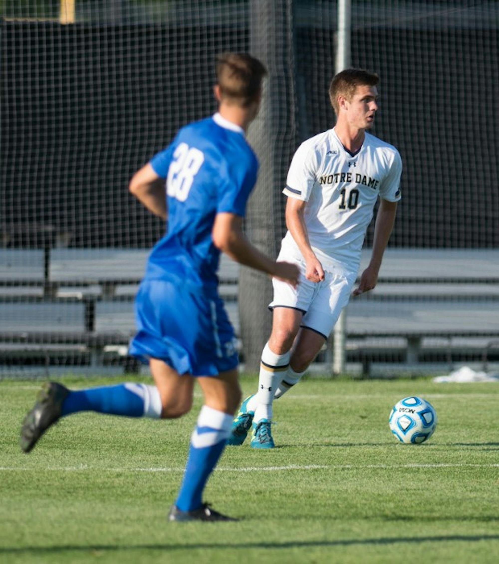 Irish sophomore defender Brandon Aubrey looks to clear the ball  during Notre Dame’s 1-0 loss to Kentucky on Sept. 8 at Alumni Stadium.