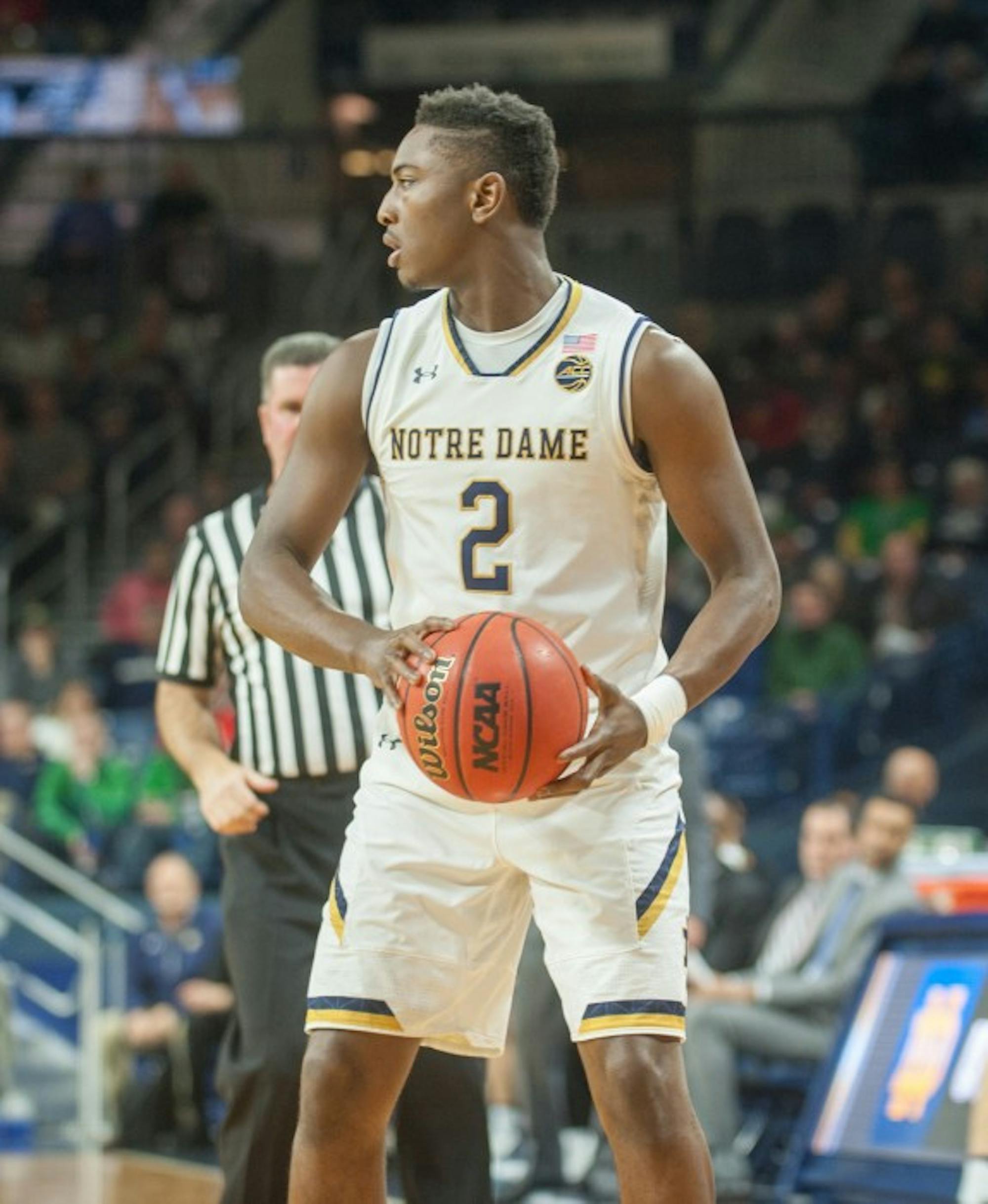 Irish freshman guard T.J. Gibbs looks to pass the ball during Notre Dame’s 87-72 win over Fort Wayne on Dec. 6 at Purcell Pavilion. Gibbs recorded six points and four assists against the Mastadons.