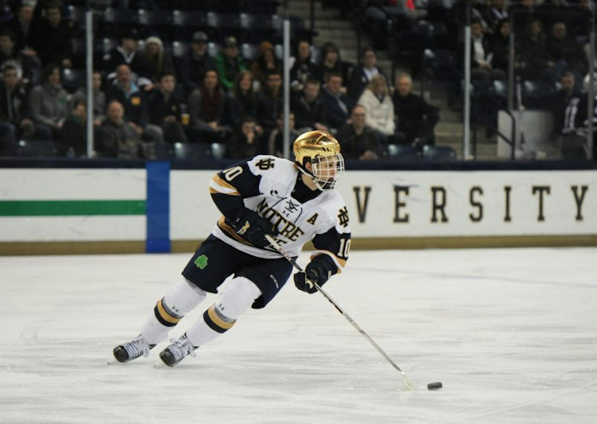 Irish junior forward Anders Bjork surveys the ice during Notre Dame’s 2-2 tie against New Hampshire on Friday at Compton Family Ice Arena. Bjork leads the team with 15 goals and 21 assists on the season.