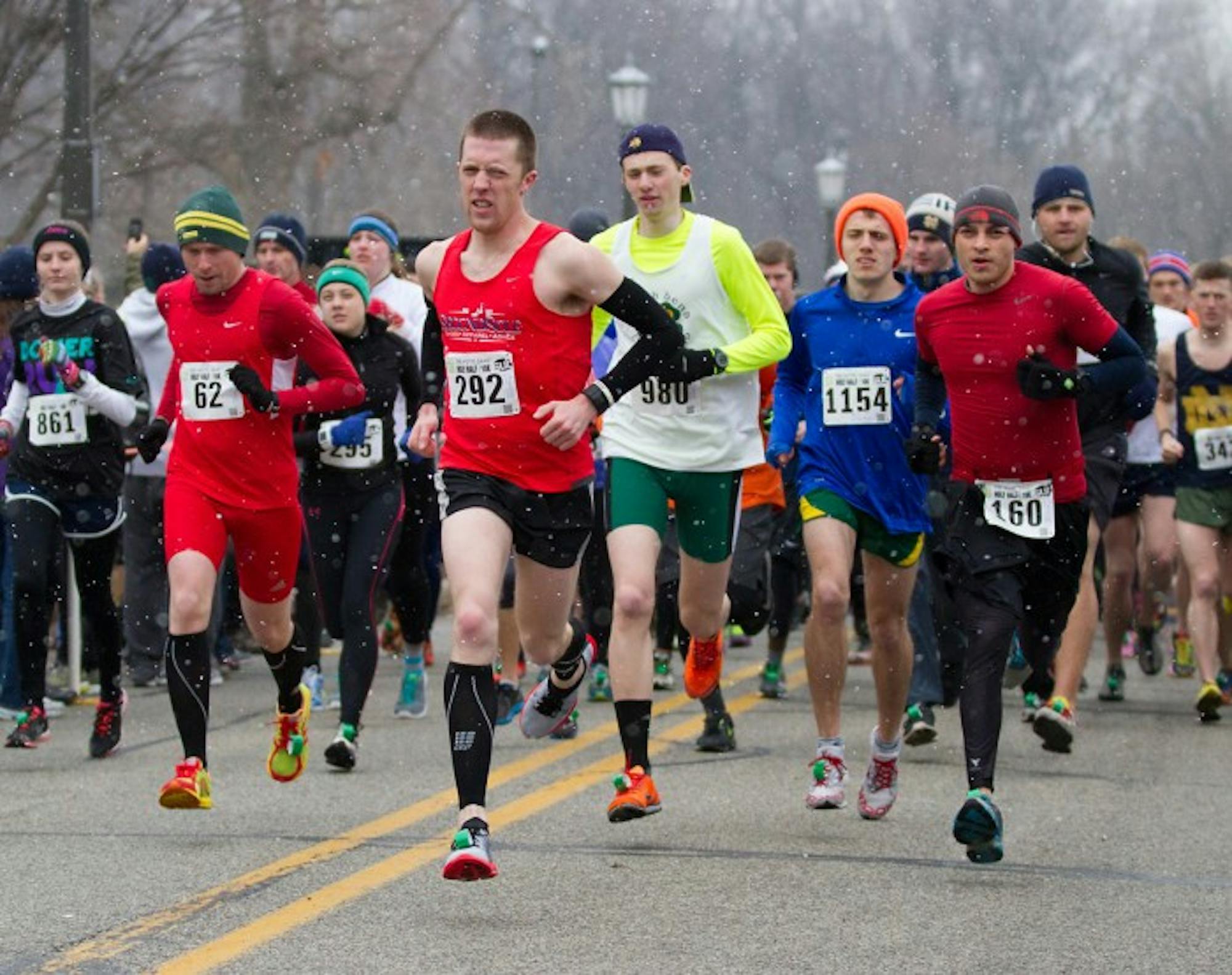 Students participating in last year’s Holy Half brave the cold and snow to ultimately finish the race’s 13.1 miles.