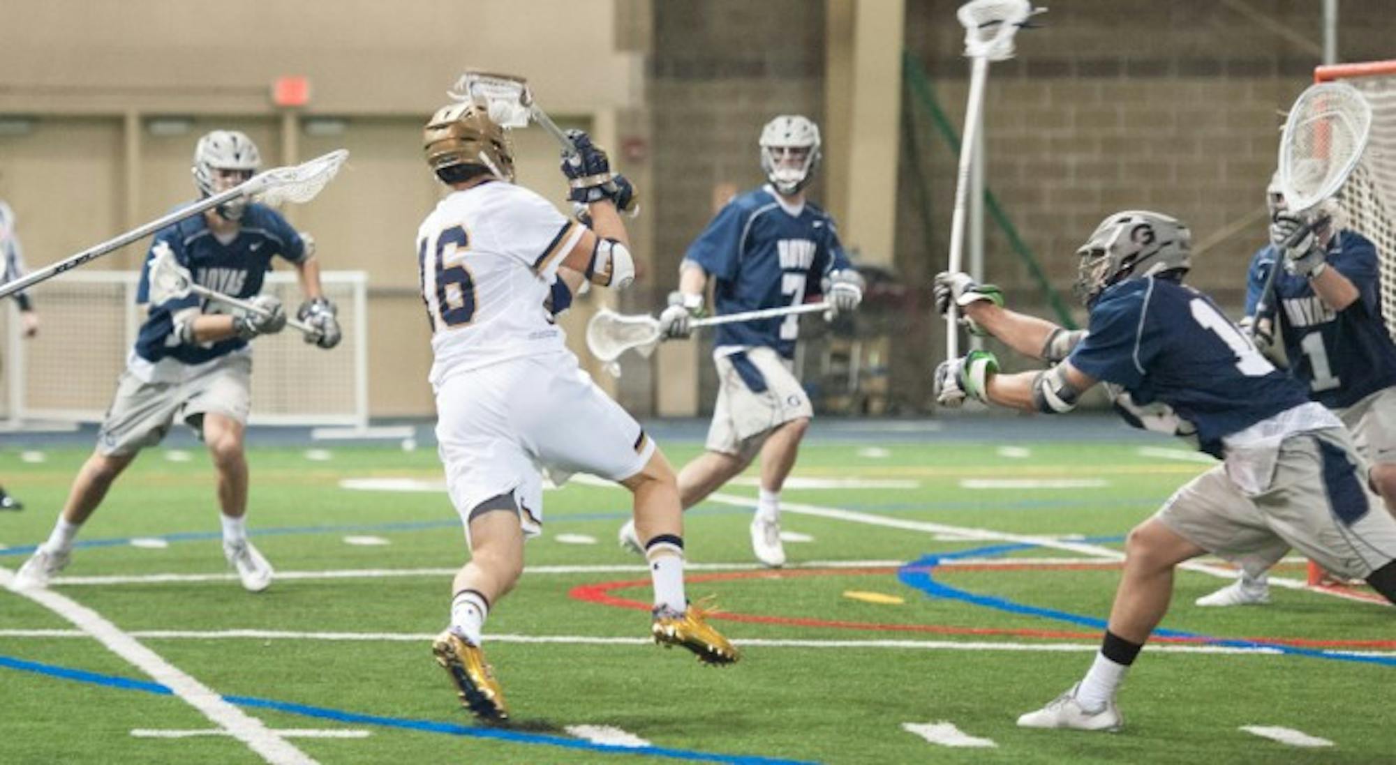 Irish senior midfielder Sergio Perkovic lines up a shot he scored on during Notre Dame’s 14-12 win over Georgetown on Feb. 14.