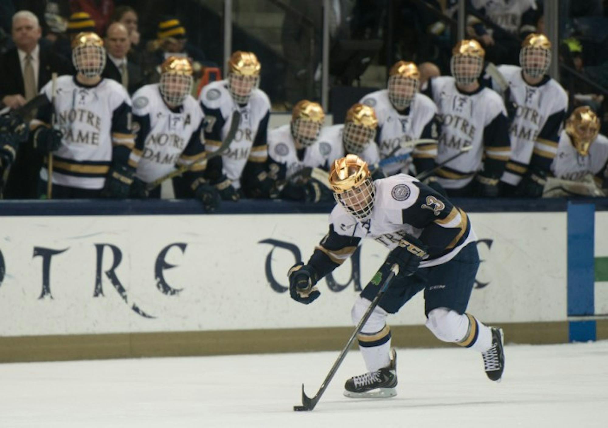 Notre Dame sophomore center Vince Hinostroza handles the puck in a 3-3 tie with Connecticut on Jan. 16.