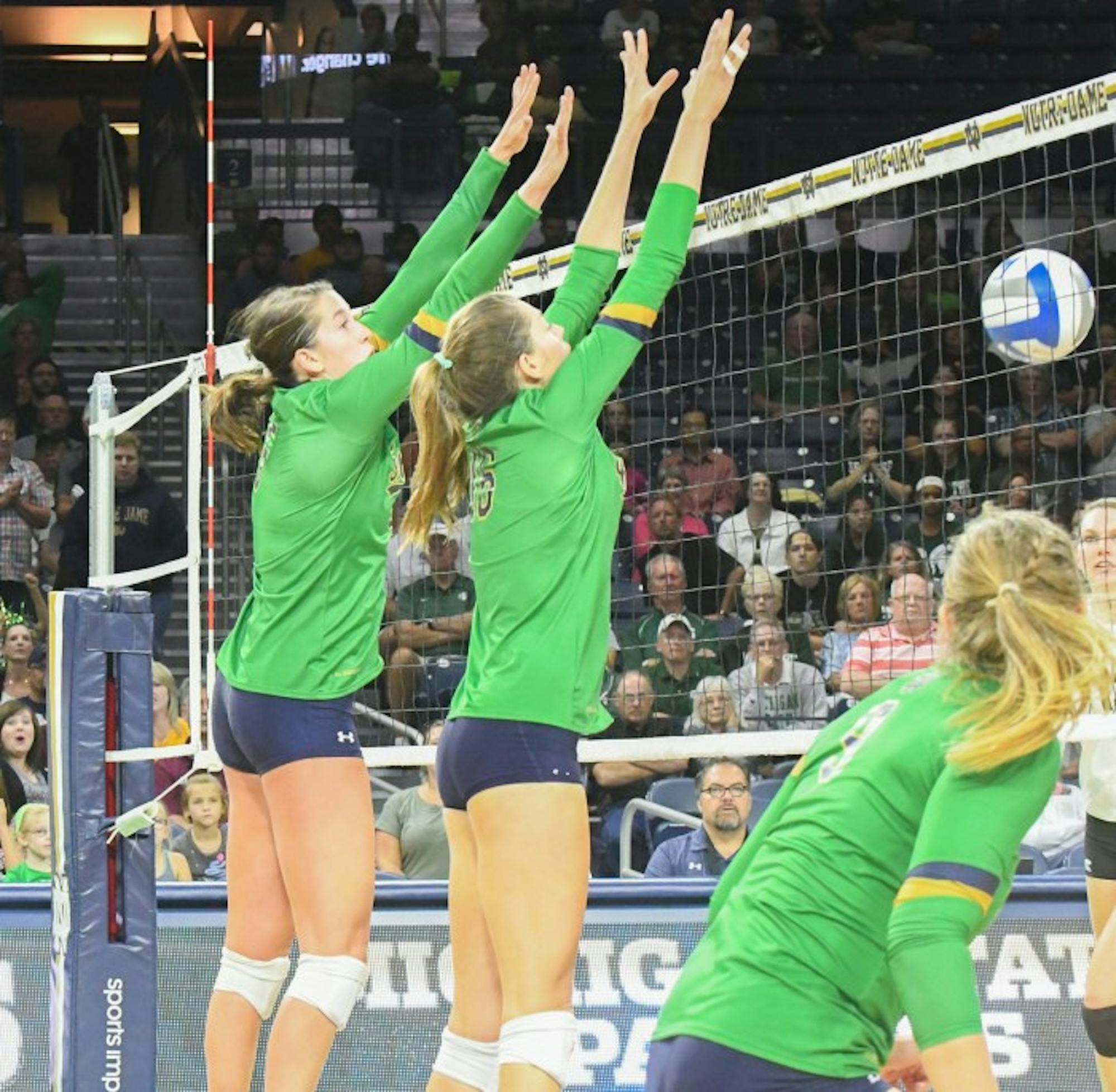 Irish junior middle blocker Meg Morningstar goes up to block during Notre Dame’s 3-0 win over MSU on Sept. 15 at Purcell Pavilion. Morningstar, along with four other players, had three or more blocks.