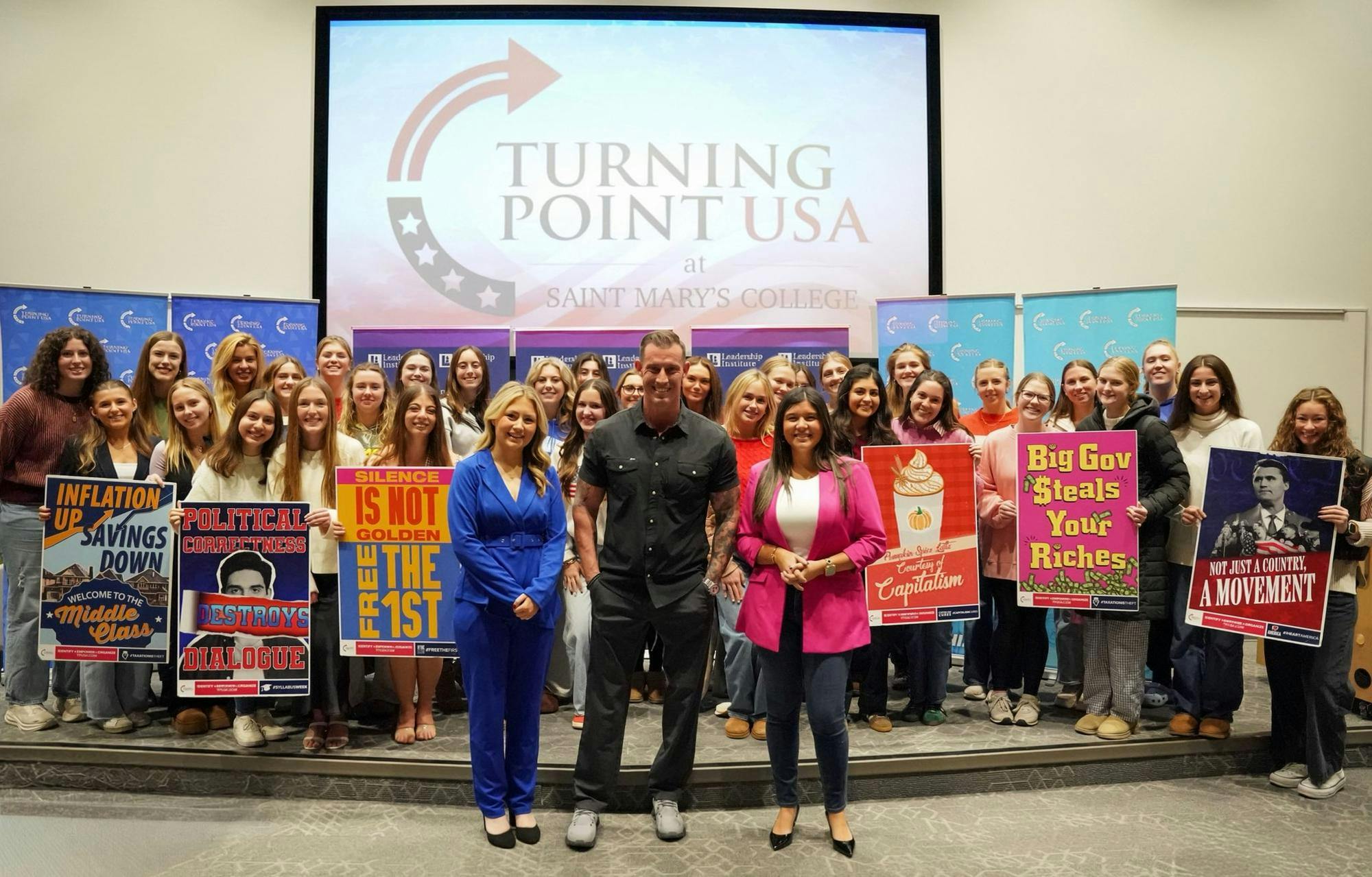 Turning Point USA members and board with speaker