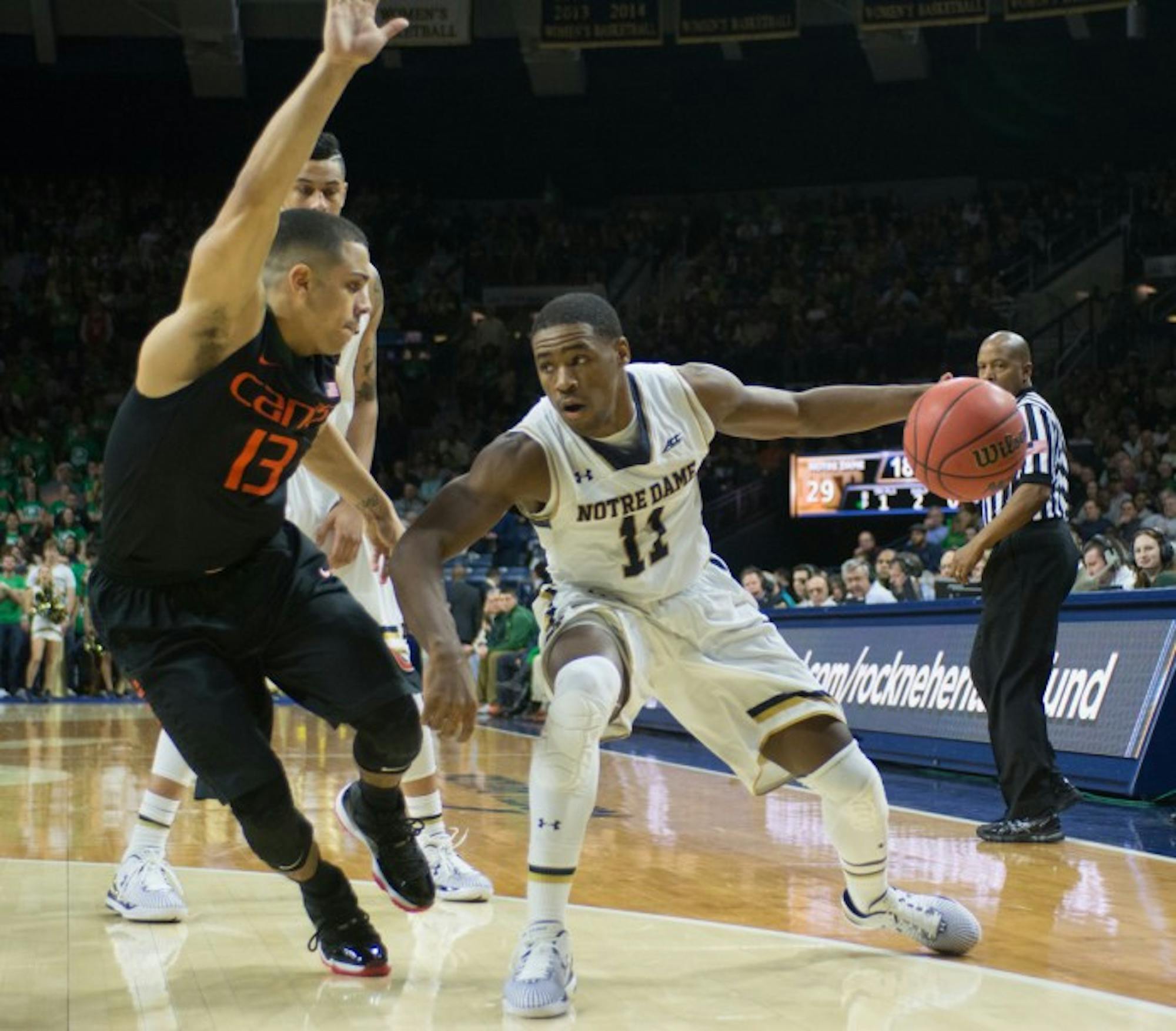 Irish sophomore Demetrius Jackson maneuvers around a defender during Notre Dame’s 75-70 win over Miami on Jan. 17 at Purcell Pavilion. Jackson has turned the ball over just 25 times in 19 games this season.