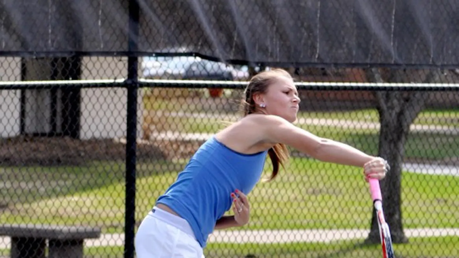 Belles junior Kayle Sexton hits a serve during Saint Mary's match against Hope on April 17.