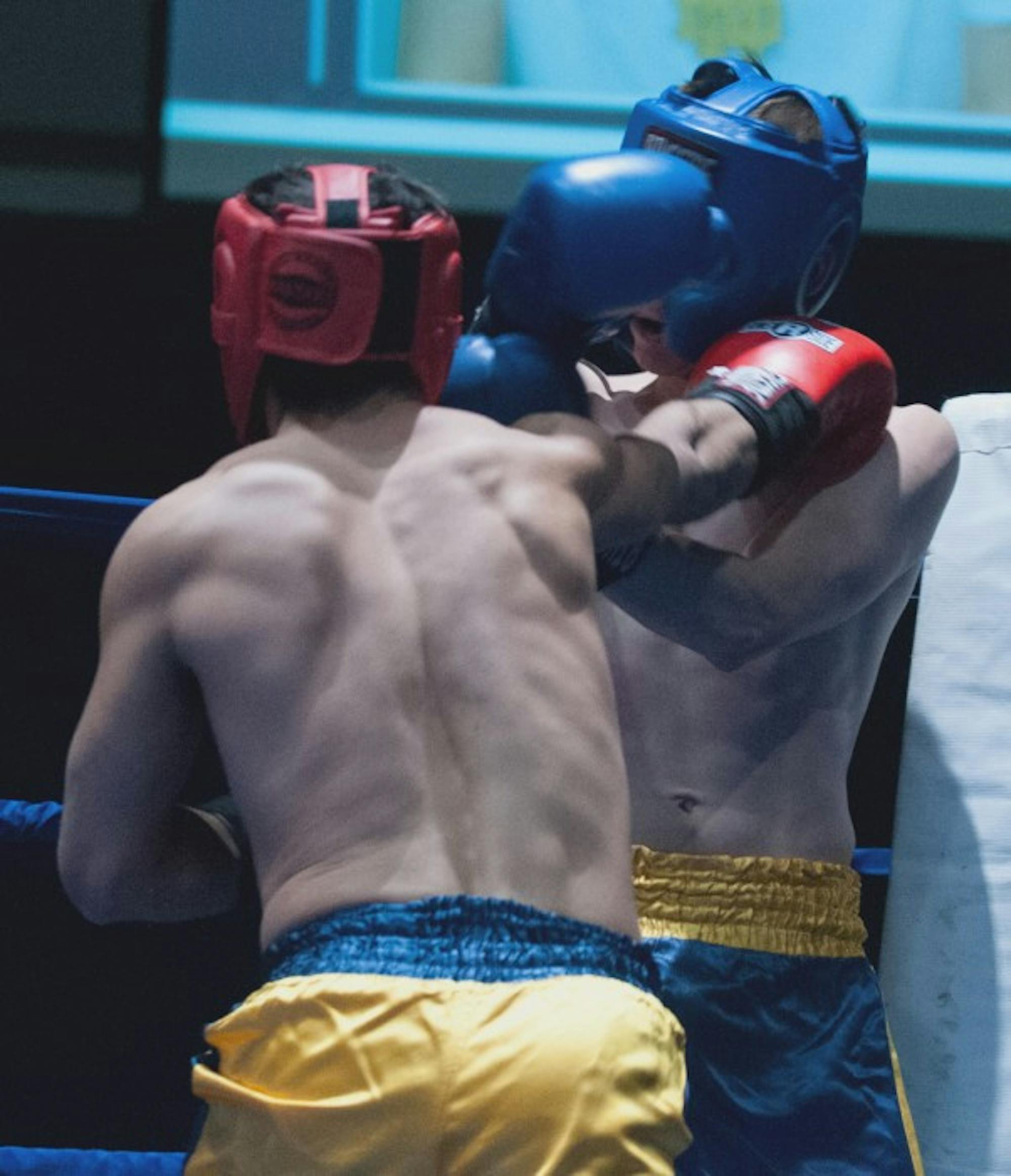 Zahm sophomore Steven Ramos lands a punch against off-campus graduate student Chase Hundman during Wednesday’s quarterfinals.