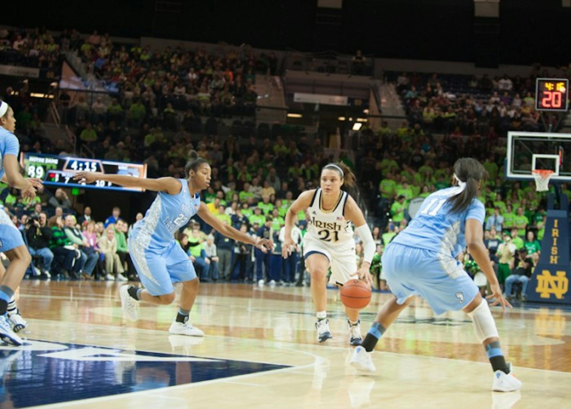 Irish junior guard Whitney Holloway races down the court during Notre Dame’s 100-75 victory over North Carolina on Feb. 27. The Irish begin competition in the NCAA tournament against Robert Morris on Saturday.