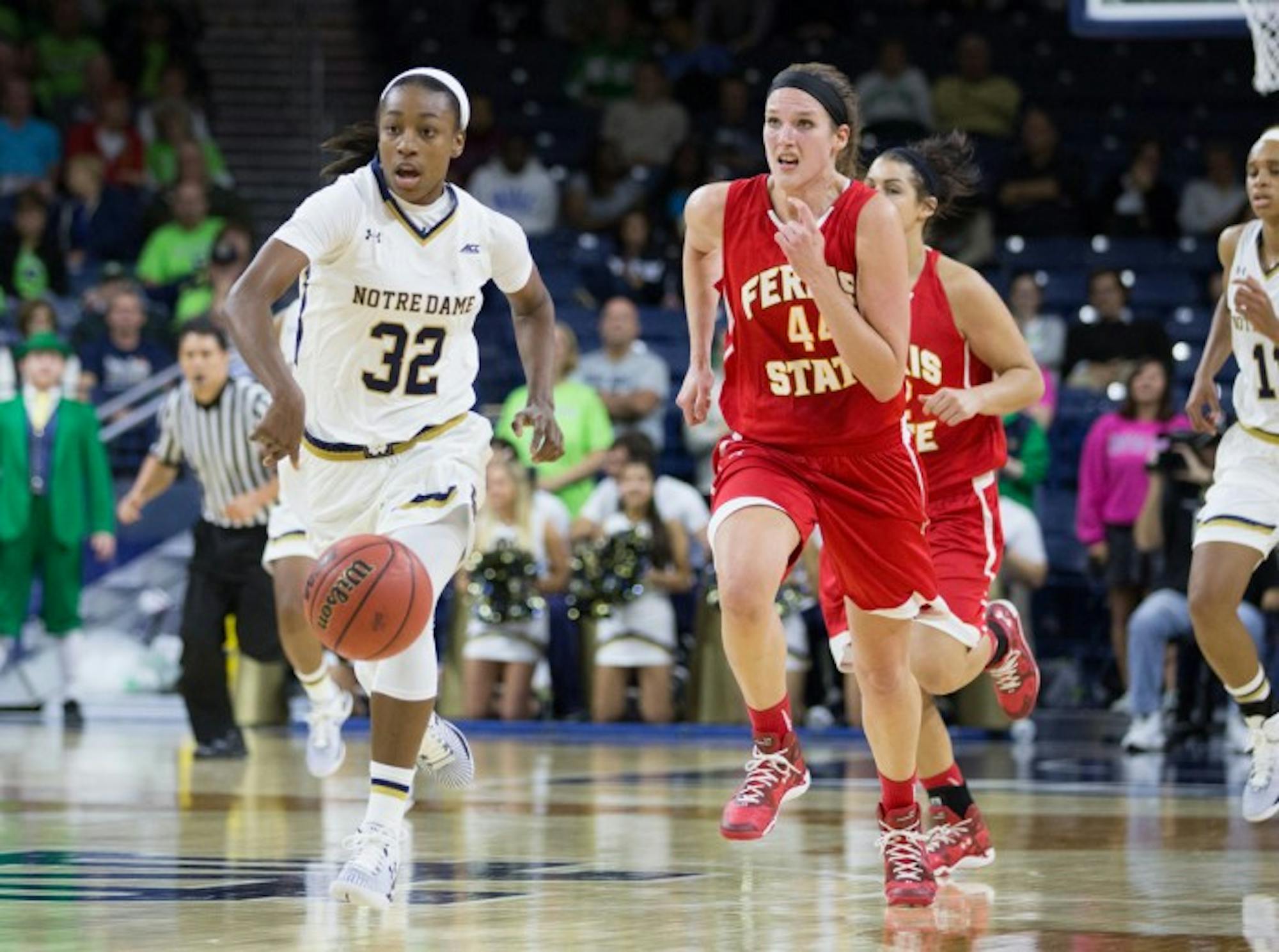 Notre Dame junior guard Jewell Loyd dribbles the ball up the court during Notre Dame’s 92-32 exhibition victory over Ferris State at Purcell Pavilion on Nov. 5. Loyd had 11 rebounds and led all scorers with 28 points during the Irish victory over Michigan State on Wednesday.