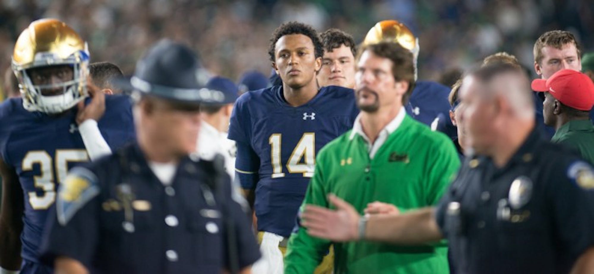 DeShone Kizer and Brian VanGorder leave the field after Notre Dame's 36-28 loss to Michigan State on Saturday.