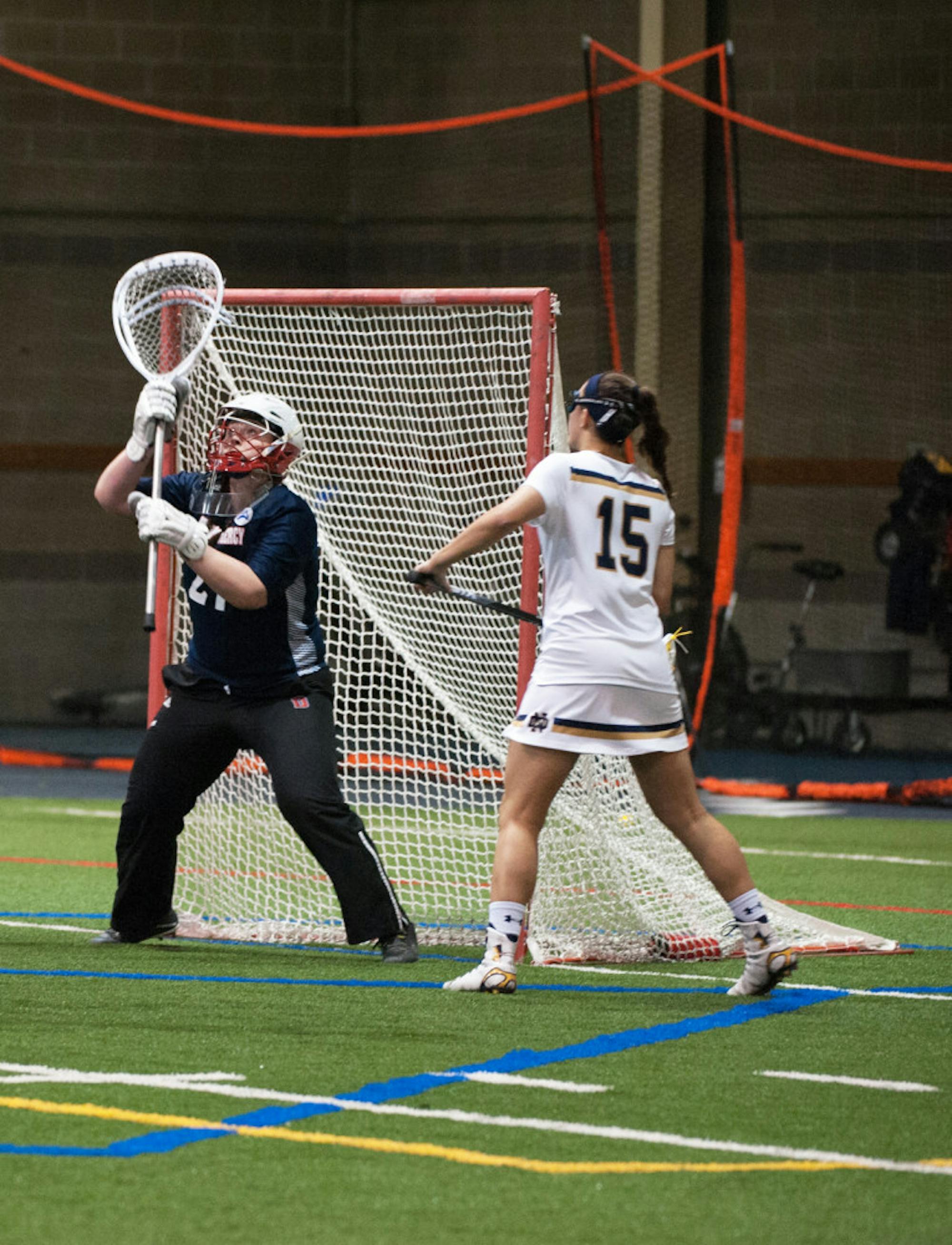 Irish senior attack Cortney Fortunato watches a shot during Notre Dame's 24-9 win over Detroit at Loftus Sports Center on Feb. 11.