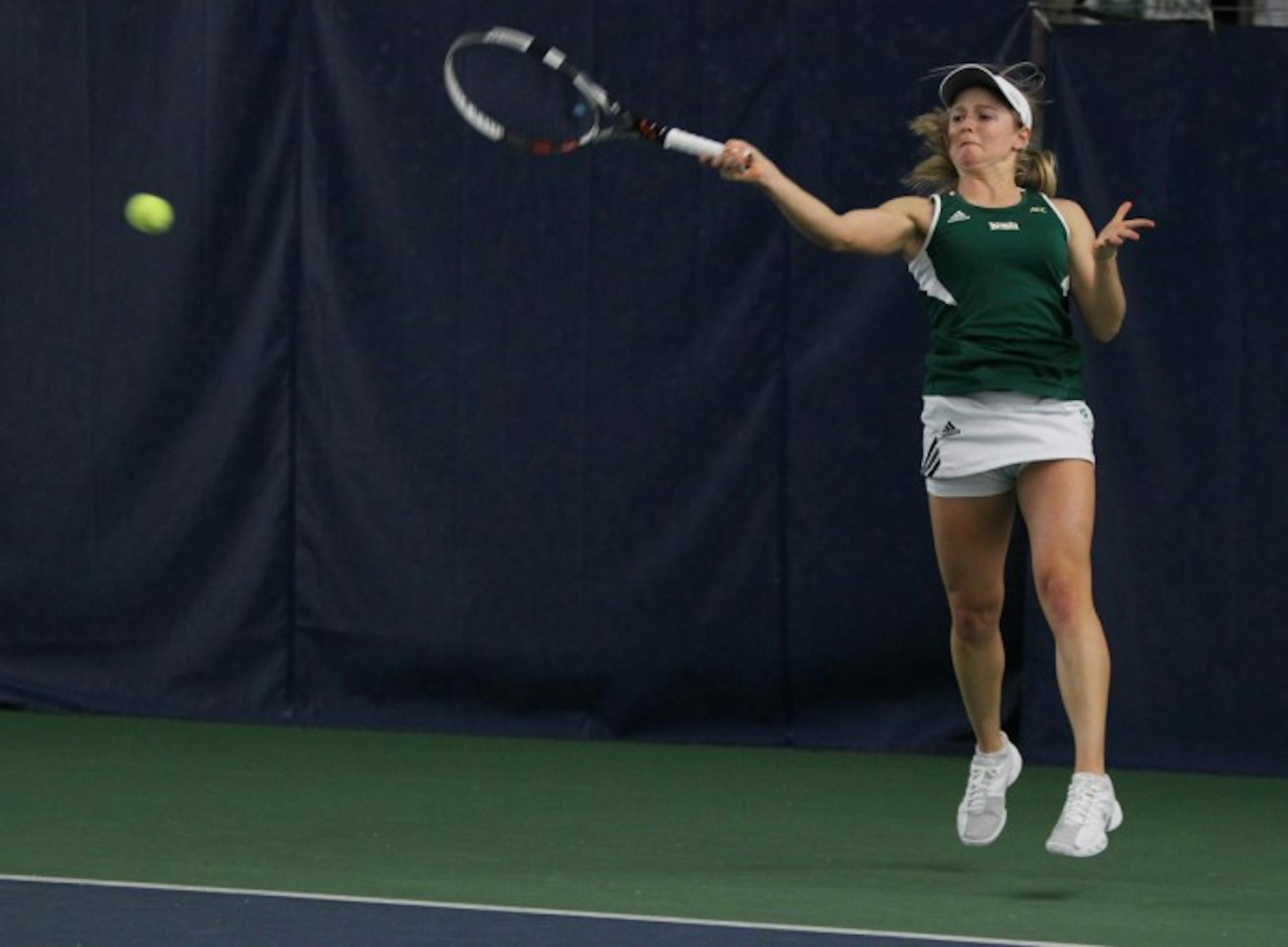 Irish sophomore Mary Closs hits a forehand during Notre Dame’s 4-3 loss to Georgia Tech on Feb.21, 2014 at Eck Tennis Pavilion. Closs and partner sophomore Jane Fennelly won both of their doubles matches this weekend.