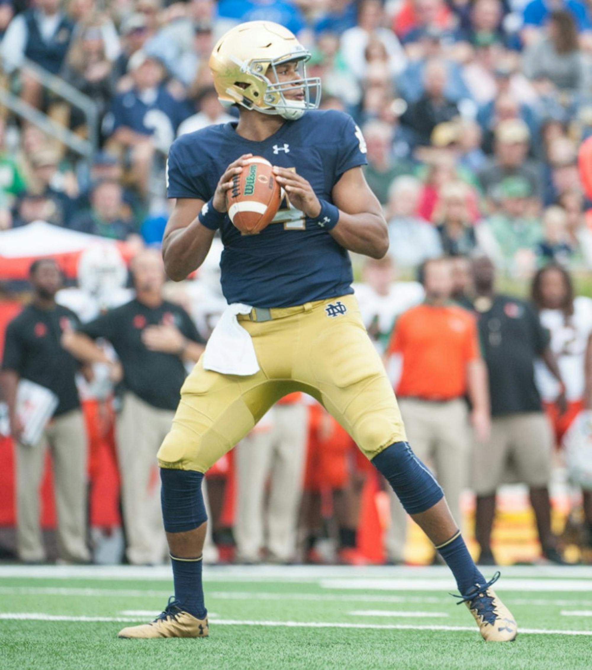 Irish junior quarterback DeShone Kizer drops back during Notre Dame’s win. He finished 25-for-38 for 263 yards and two touchdowns.