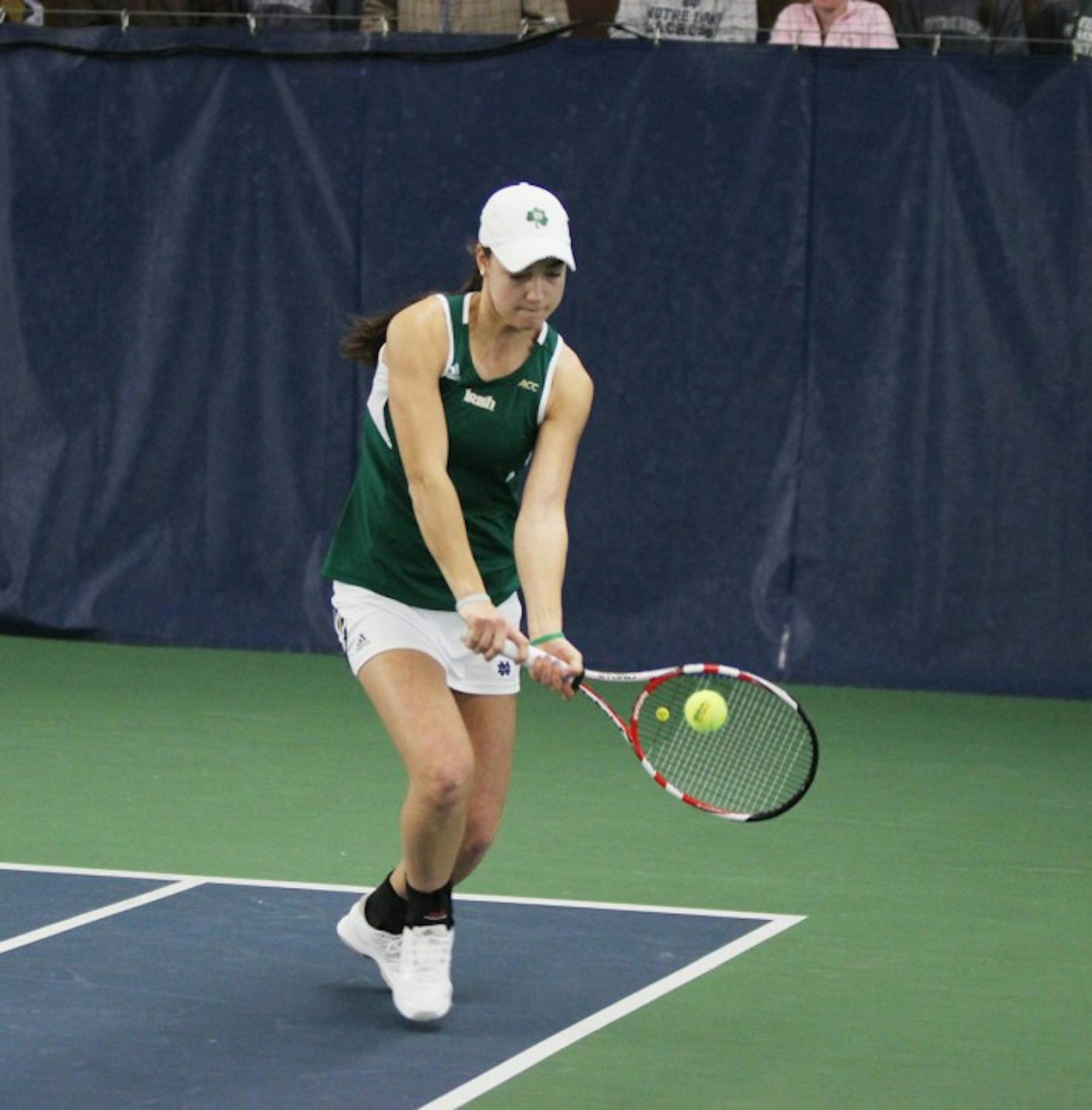 Notre Dame junior Quinn Gleason, who occasionally partnered with sophomore Jane Fennelly in doubles play in the past, volleys the ball during a 4-3 loss to Georgia Tech in Eck Tennis Center on Feb. 21, 2014.