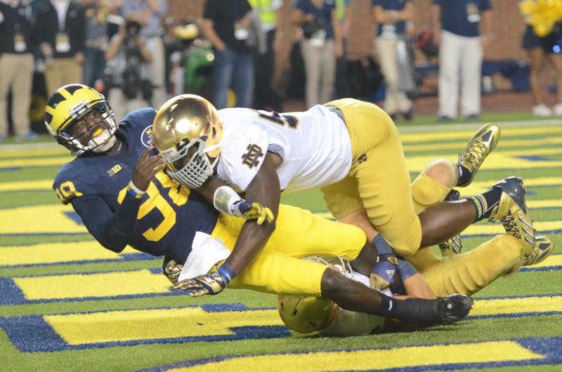 20130907-2013-Football-20130907-Away-Interception-John-Ning-Loss-michigan-Michigan-Stadium-Night-Game-Notre-Dame-Shembo-Touchdown