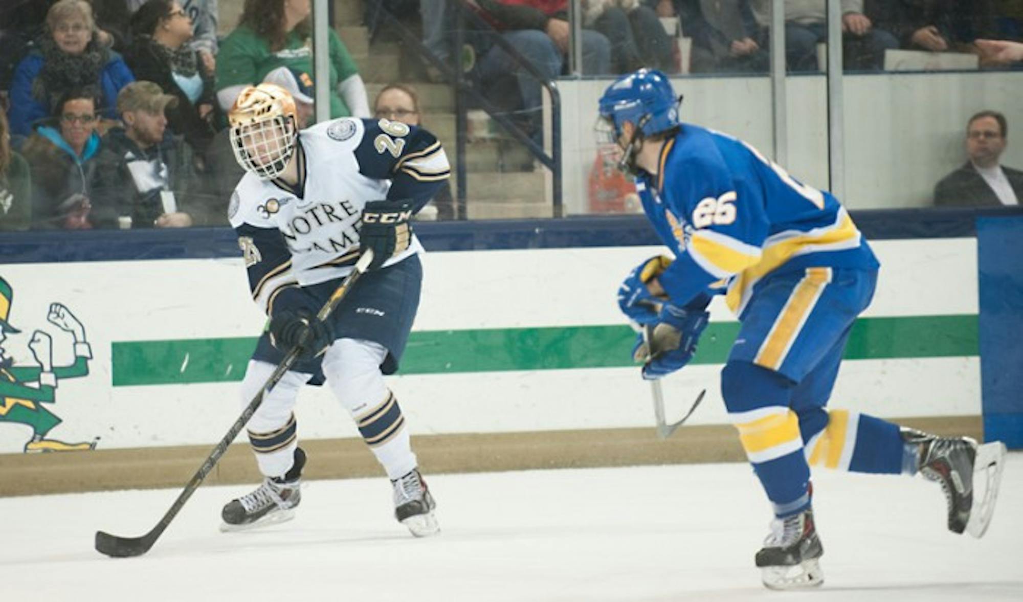 Steven Fogarty pushes the puck ahead against Lake Superior State on Saturday, a 4-2 Irish win. Fogarty scored two goals in the game.