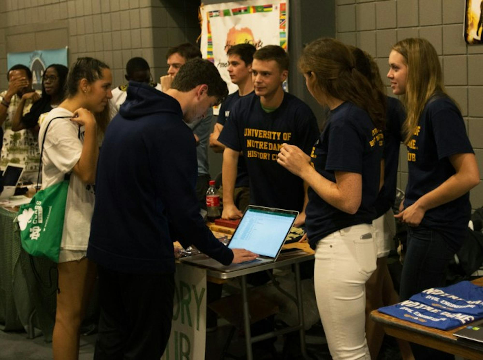Students sign up for club email lists at the  activities night. The event, which was sponsored by the Student Activities Office featured over 450 clubs.