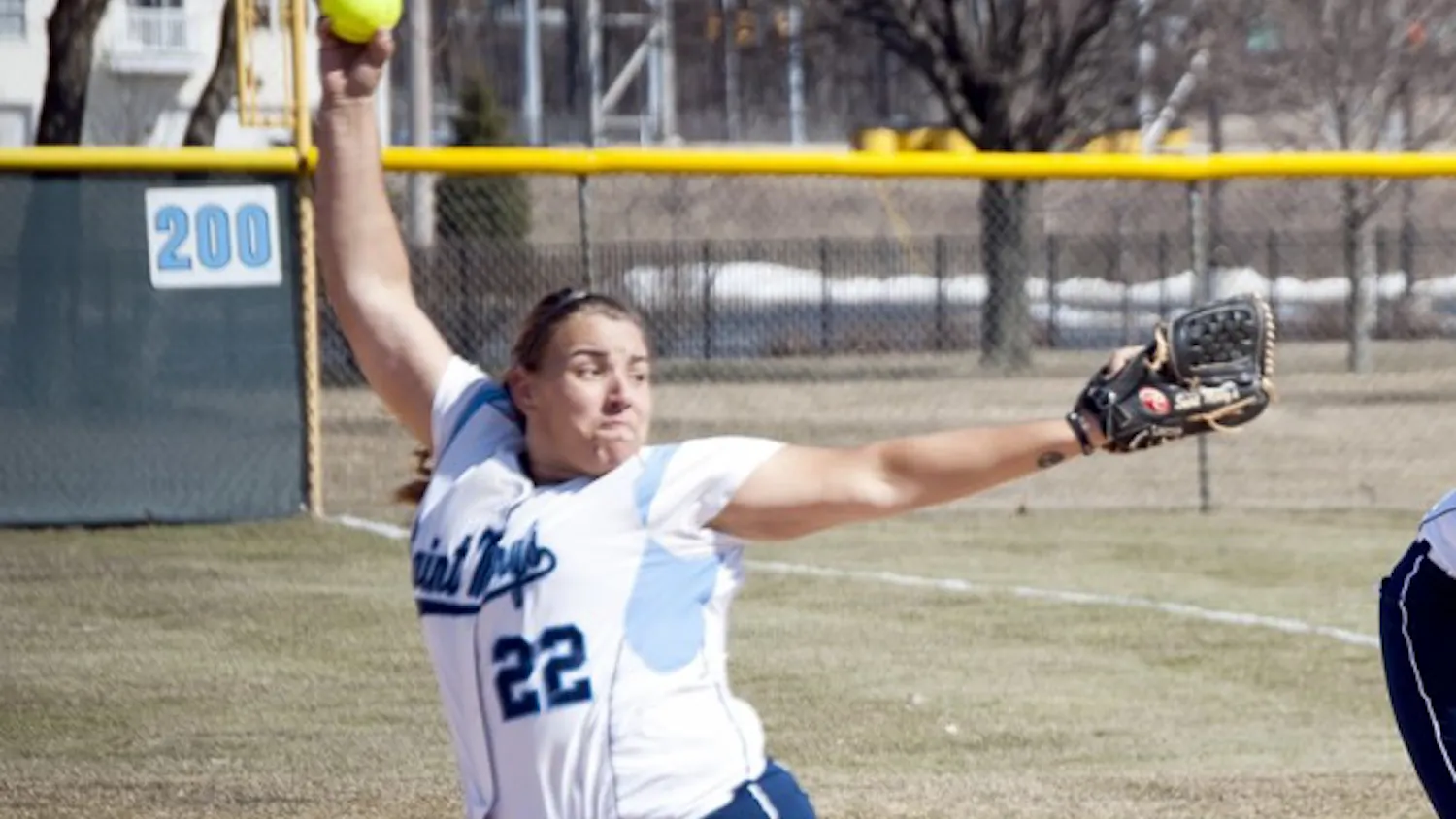 Senior pitcher Callie Selner delivers a pitch March 28, 2013 against Defiance. Selner leads the Belles with a 2.62 ERA this season and will return to the mound today.