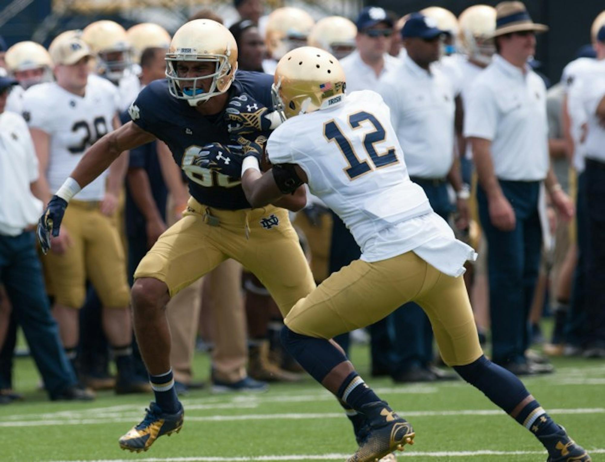 Senior cornerback Devin Butler defends former Irish receiver Corey Robinson during the 2015 Blue-Gold Game at LaBar Practice Complex on April 18, 2015.