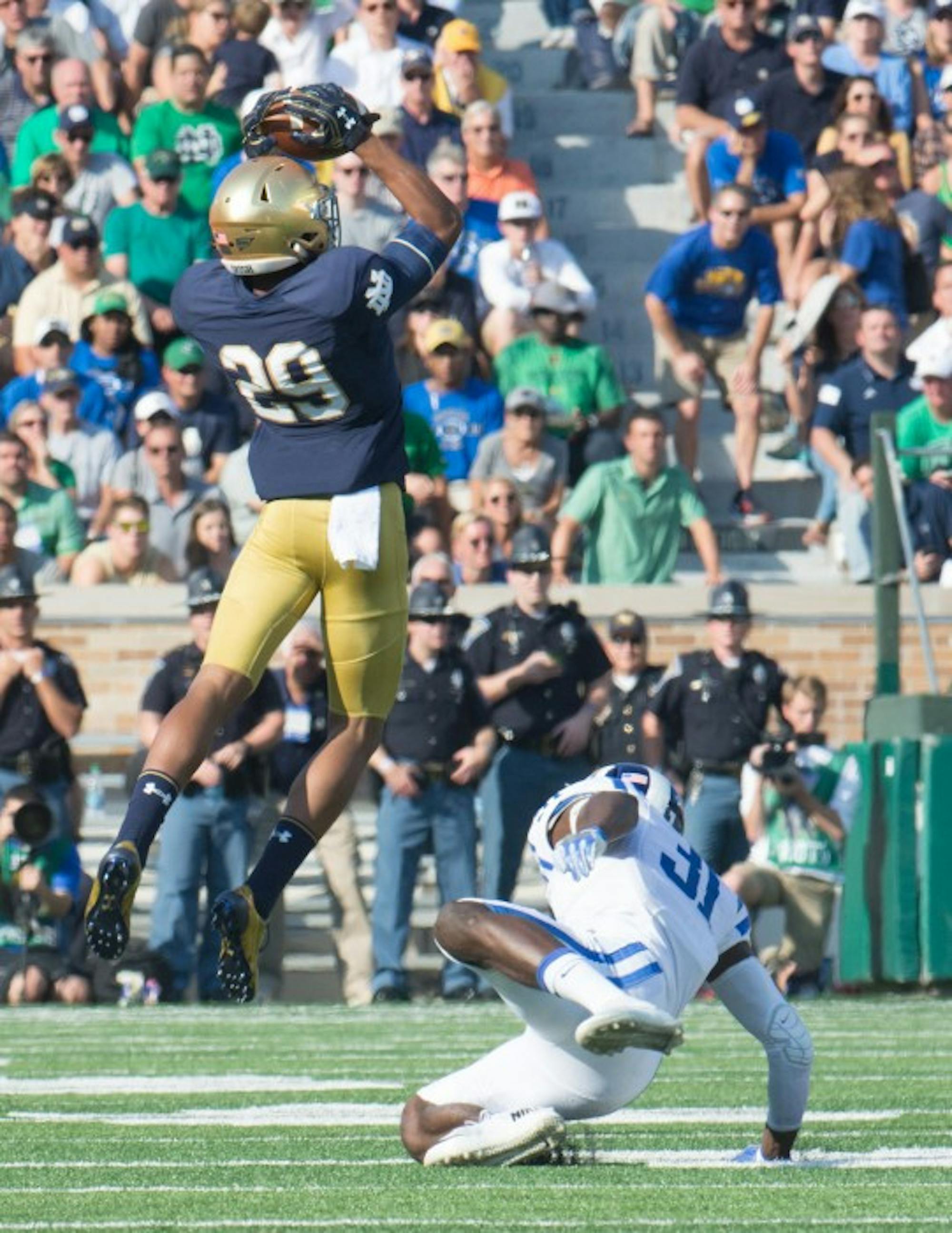 Irish freshman receiver Kevin Stepherson elevates to make a catch during Notre Dame’s 38-35 loss to Duke on Saturday at Notre Dame Stadium.