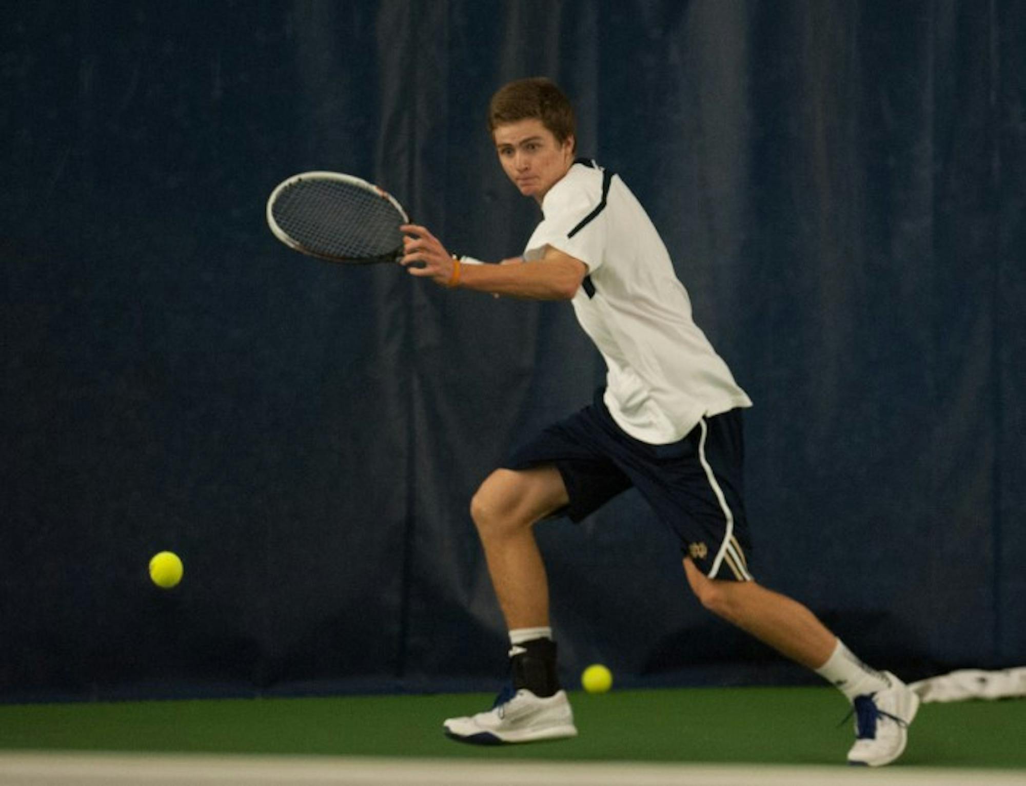 Notre Dame junior Quentin Monaghan prepares to return a shot during a match against Virginia Tech at the Eck Tennis Center on Feb. 28.