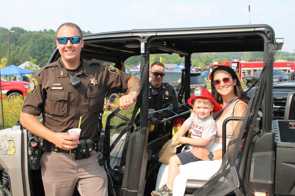 Charlie takes a ride with Oceana County Sheriff's Dept..JPG
