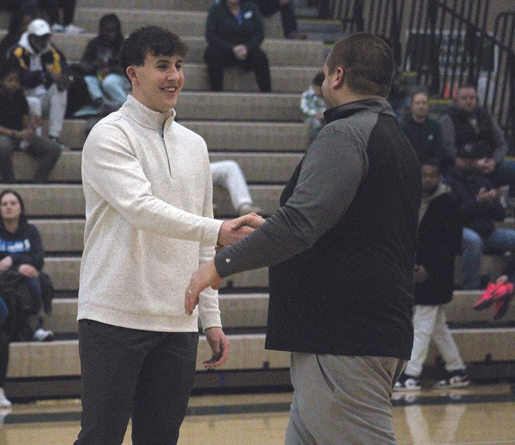 Gallery - Reeths-Puffer vs. Mona Shores boys basketball (and Jaxson Whitaker pregame honor)