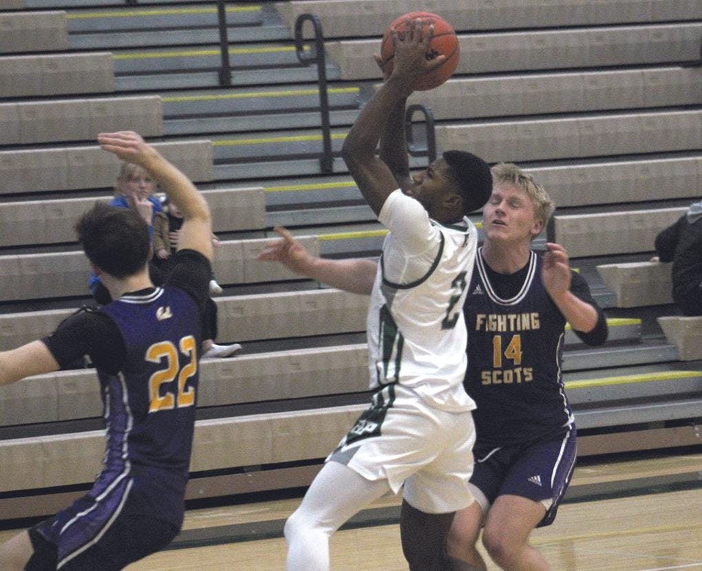 Gallery - Reeths-Puffer vs. Caledonia boys basketball