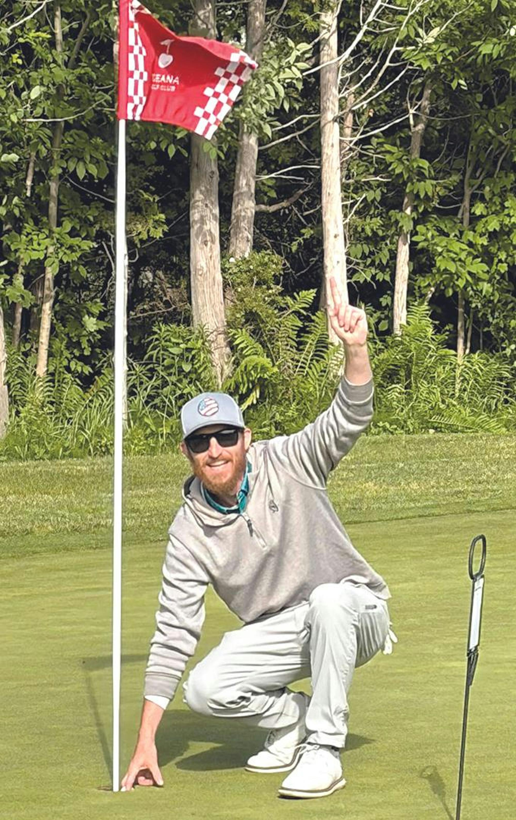 joe foster open cody tubbs ace on hole 7 8 iron.jpg