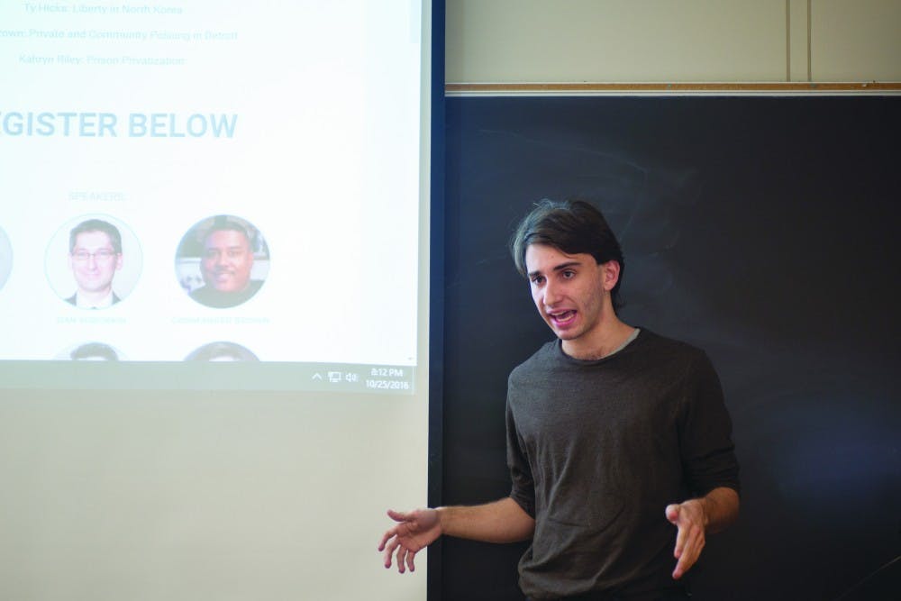 Brandon Kerr talks about the Students for Liberty 2016 Michigan Regional Conference during a Students for Liberty meeting on October 25. (LIAM DAVIS | FOR THE POST)
