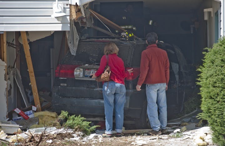 Vehicle plows into South Shafer Street apartment building  