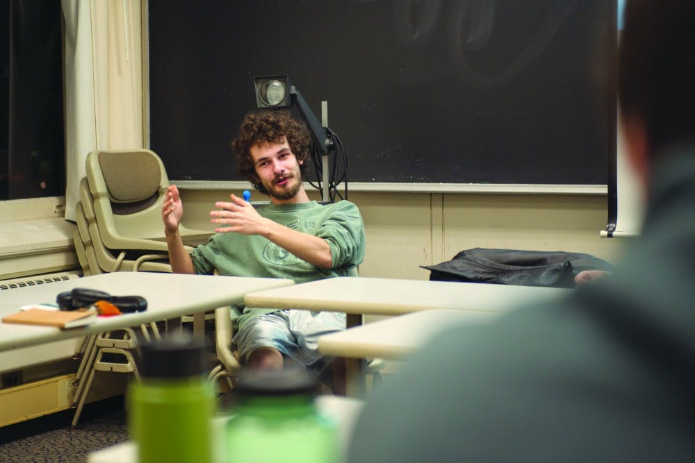 Sam Raptis participates in a discussion about gun control during a Students for Liberty meeting on October 25. (LIAM DAVIS | FOR THE POST)