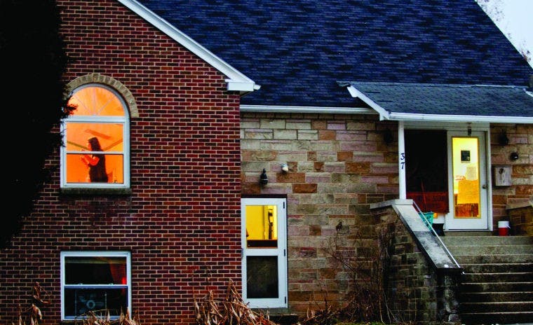 Dance studio students springing onto Stuart's stage for concert  