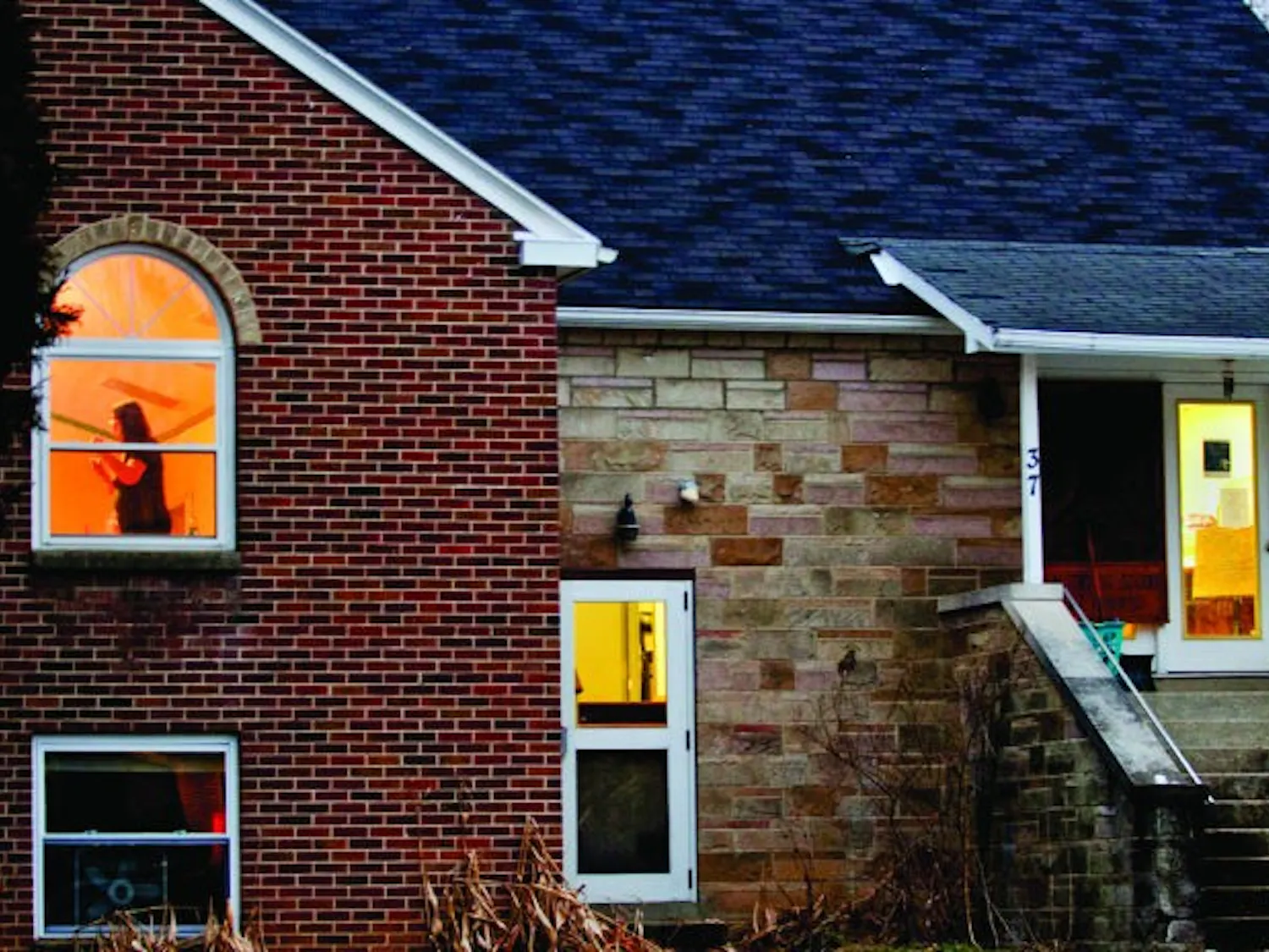 Dance studio students springing onto Stuart's stage for concert