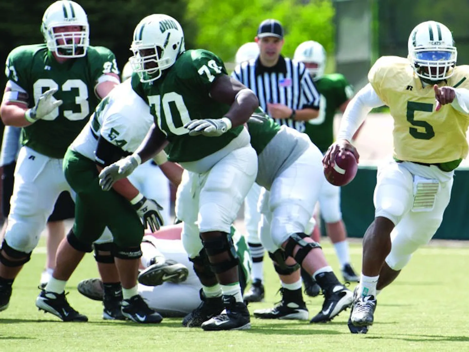 Football: Green, white tussle tomorrow