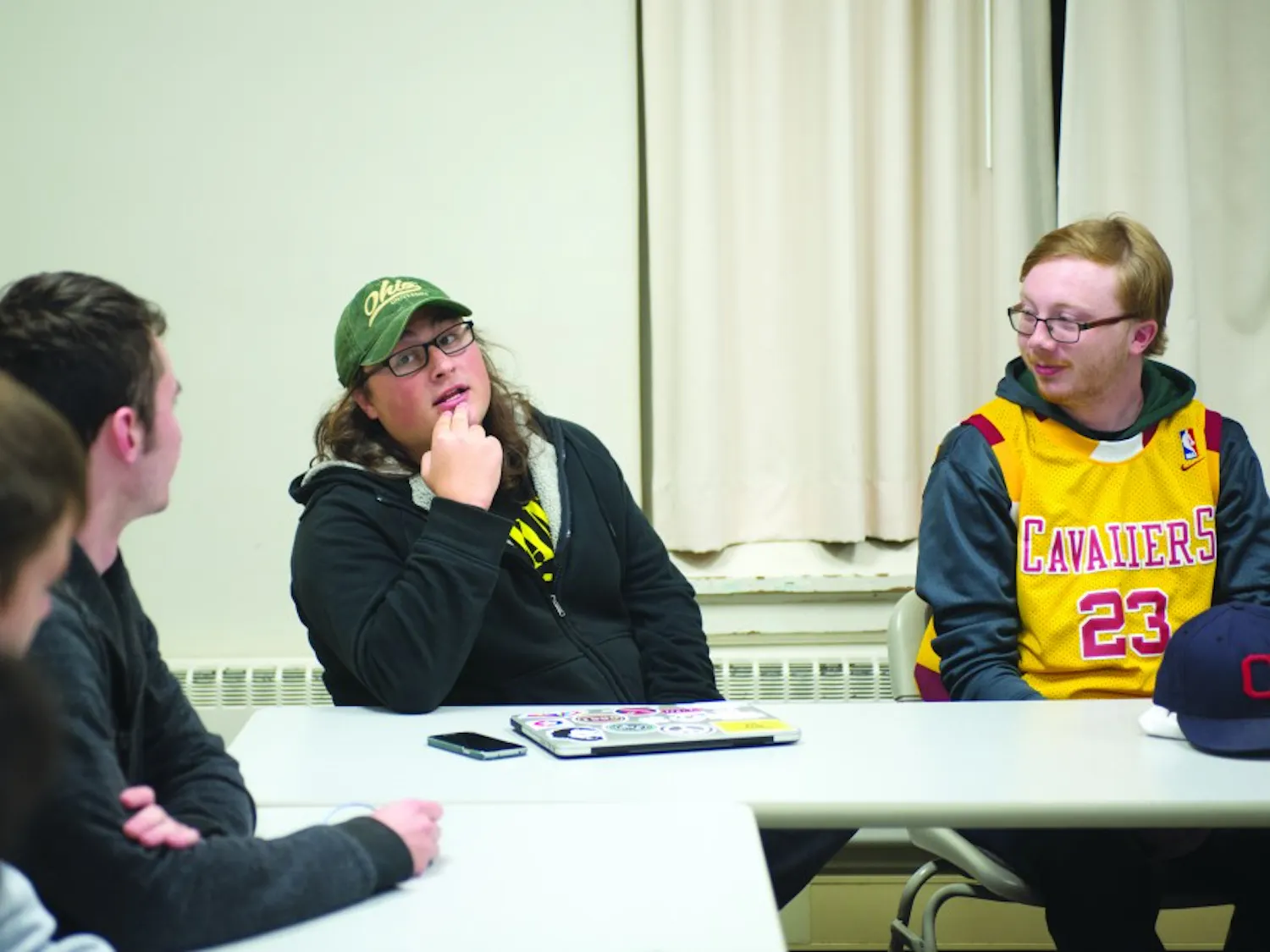 Jacob Koval, left, and Tim Slocombe, right, discuss the Gary Johnson campaign during a Students for Liberty meeting on October 25. (LIAM DAVIS | FOR THE POST)
