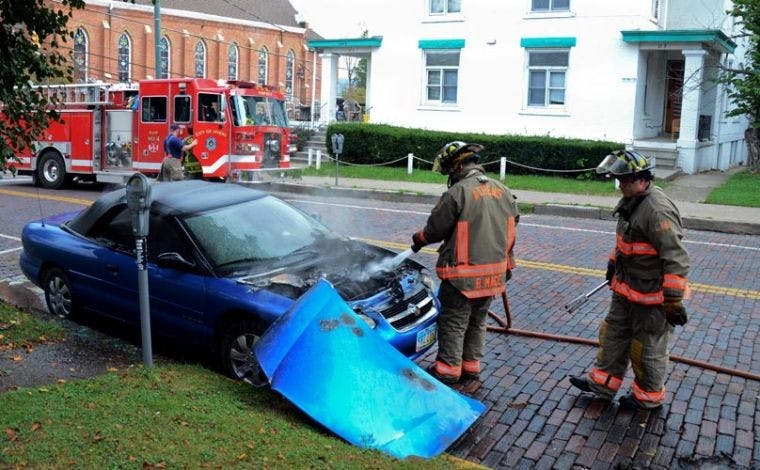 High school student's car catches fire near Mill  