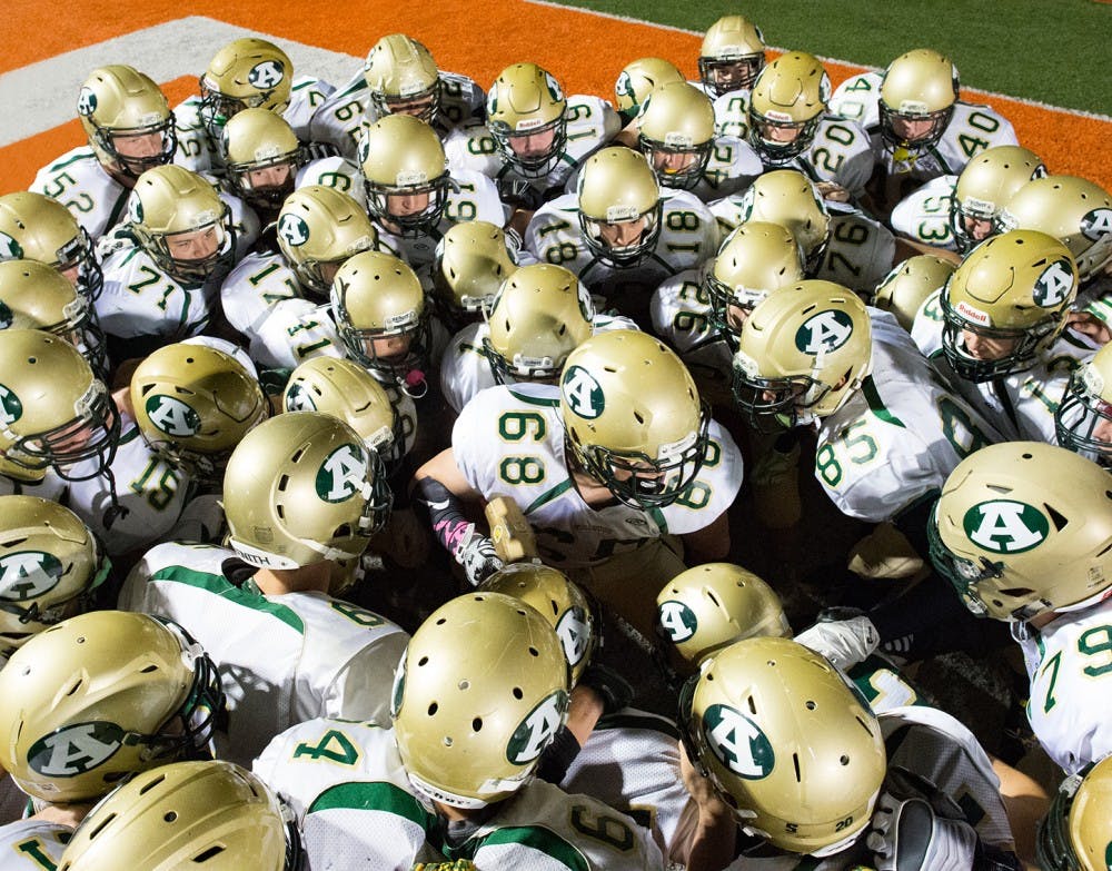 Nick Engelman (68) gets the Athens High football team hyped up before kickoff agaist Nelsonville York Friday night MATT STARKEY|FOR THE POST