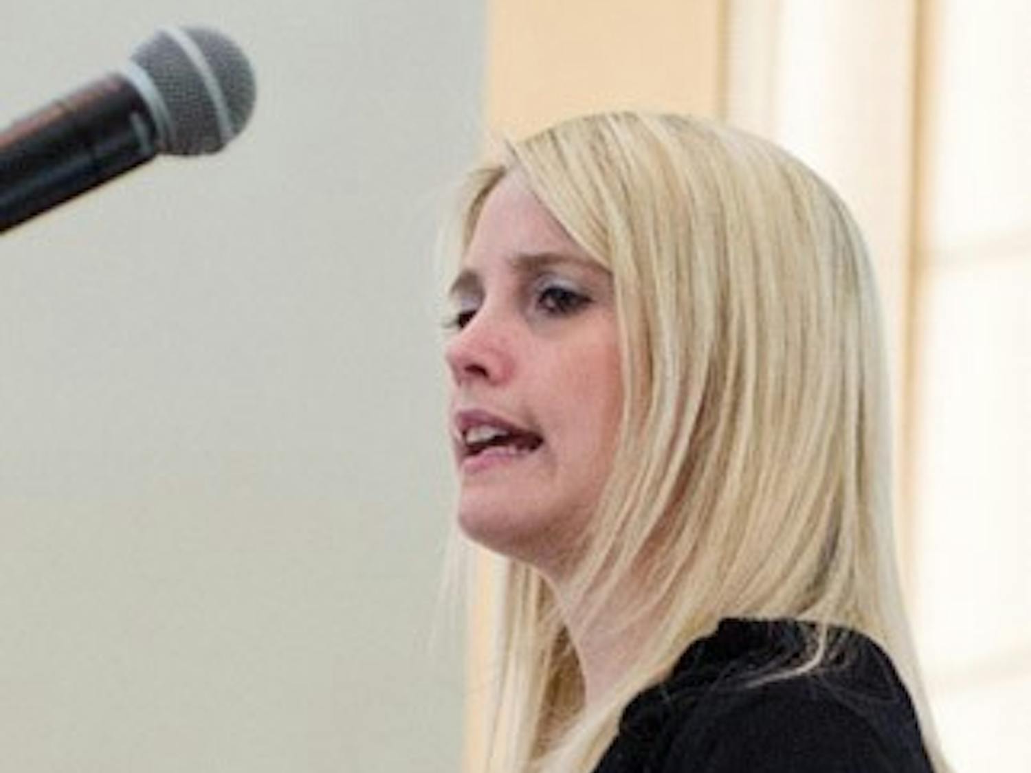 Speaker shares personal story of childhood abuse