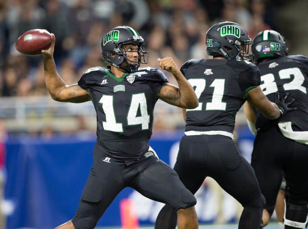 Greg Windham (14) throws against Western Michigan on Ford Field in Detroit Friday night MATT STARKEY|STAFF PHOTOGRAPHER