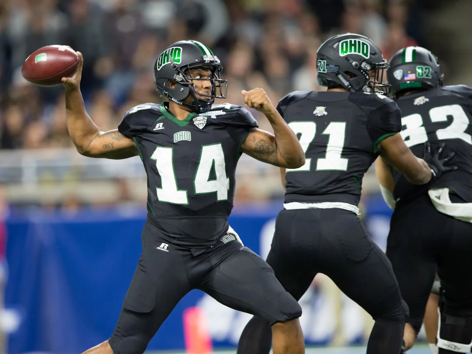 Greg Windham (14) throws against Western Michigan on Ford Field in Detroit Friday night MATT STARKEY|STAFF PHOTOGRAPHER