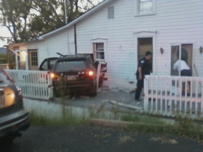 Car chase ends in collision with house  