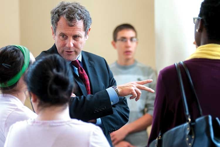 Brown's priority student debt, aid during visit  