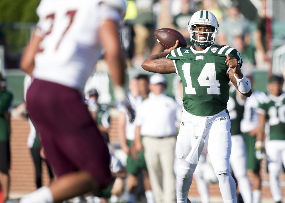 Ohio redshirt senior quarterback Greg Windham (#14) passes downfield against Texas State on Saturday, September 3, 2016. Windham passed for 308 yards in his first game as starting quarterback. 