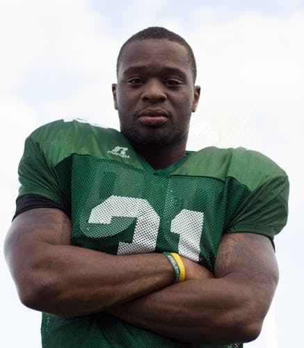 Football: Running back returns to high school roots  