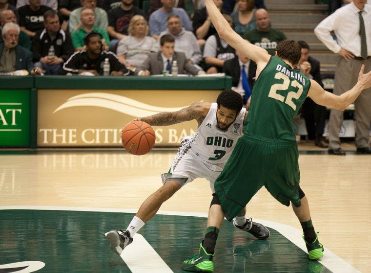 Men's Basketball: 'Cats sink Raiders with late-game push  
