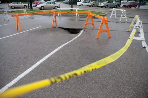 Sinkhole opens in Convo parking lot  