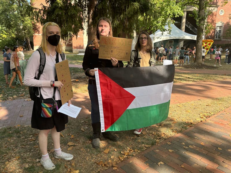 Students for Justice in Palestine held silent protest amid president’s pizza party